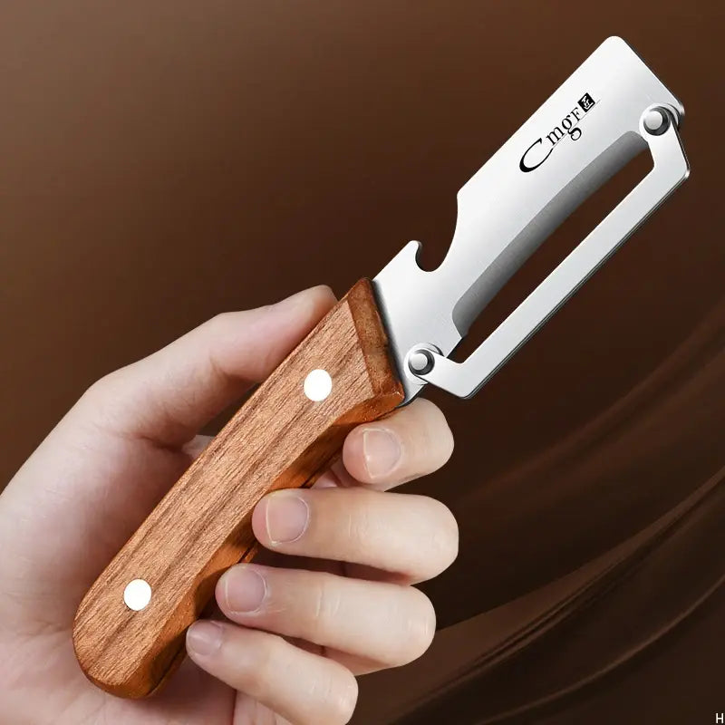 1pcs Stainless steel peeler with wooden handle for peeling and slicing fruits and vegetables | Durable and smooth operation - Nexvibe