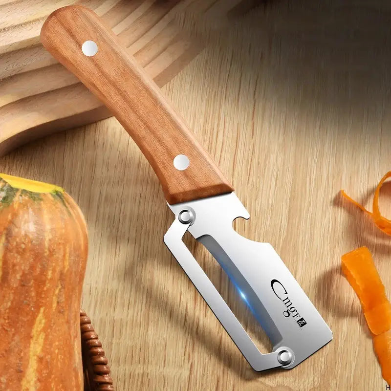 1pcs Stainless steel peeler with wooden handle for peeling and slicing fruits and vegetables | Durable and smooth operation - Nexvibe