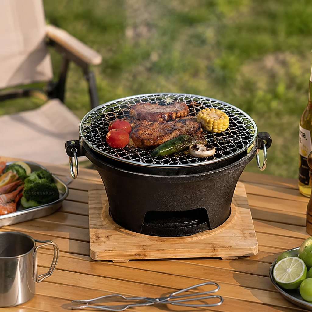 KL1 Portable Charcoal Grill Mini Tabletop BBQ Cast Iron Body Stainless Steel Removable Grill Net Heat-Resistant Wooden Base Silver Carry Rings Outdoor Picnic and Backyard Cooking